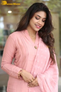 Actress Malavika Satheesan photoshoot in a pink dress
