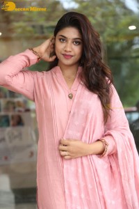 Actress Malavika Satheesan photoshoot in a pink dress