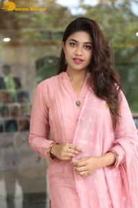 Actress Malavika Satheesan photoshoot in a pink dress