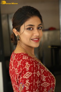 Actress Malavika Satheesan in a red dress