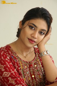 Actress Malavika Satheesan in a red dress