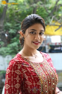 Actress Malavika Satheesan in a red dress