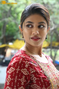 Actress Malavika Satheesan in a red dress