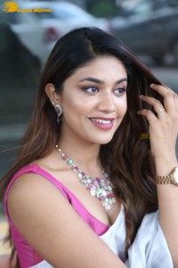 Actress Malavika Satheesan in a white saree