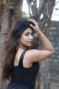 actress malavika satheesan photoshoot in a black dress