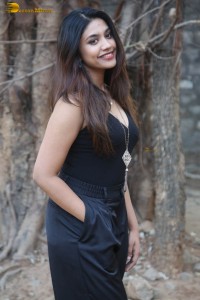 actress malavika satheesan photoshoot in a black dress