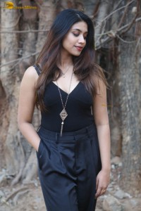 actress malavika satheesan photoshoot in a black dress
