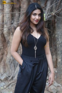 actress malavika satheesan photoshoot in a black dress