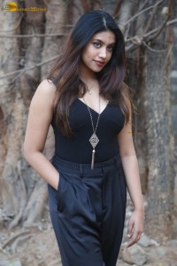 actress malavika satheesan photoshoot in a black dress