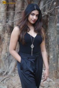 actress malavika satheesan photoshoot in a black dress