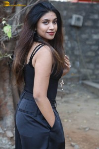 actress malavika satheesan photoshoot in a black dress