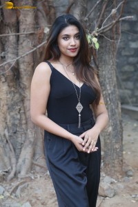 actress malavika satheesan photoshoot in a black dress