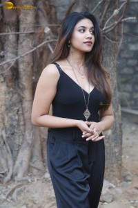 actress malavika satheesan photoshoot in a black dress