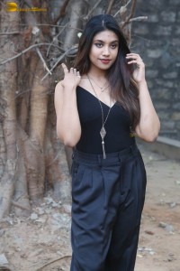 actress malavika satheesan photoshoot in a black dress