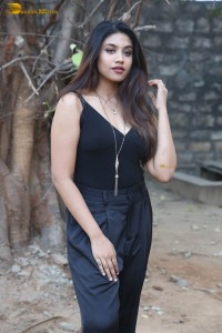 actress malavika satheesan photoshoot in a black dress
