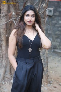 actress malavika satheesan photoshoot in a black dress