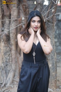actress malavika satheesan photoshoot in a black dress