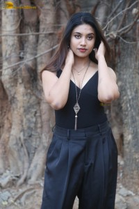 actress malavika satheesan photoshoot in a black dress
