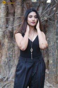 actress malavika satheesan photoshoot in a black dress