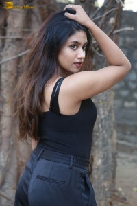 actress malavika satheesan photoshoot in a black dress