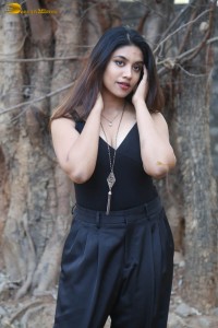 actress malavika satheesan photoshoot in a black dress