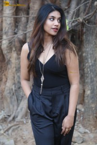 actress malavika satheesan photoshoot in a black dress