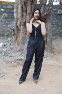 actress malavika satheesan photoshoot in a black dress