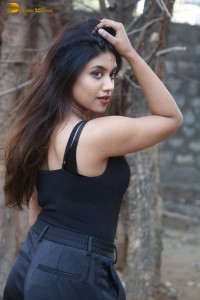 actress malavika satheesan photoshoot in a black dress