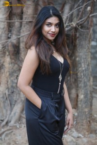 actress malavika satheesan photoshoot in a black dress