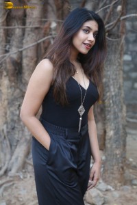 actress malavika satheesan photoshoot in a black dress