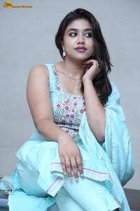 actress Malavika Satheesan cute in a light blue salwar dress