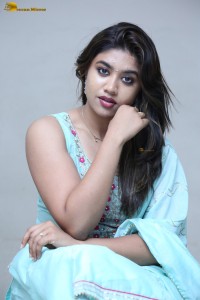 actress Malavika Satheesan cute in a light blue salwar dress