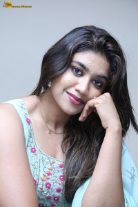 actress Malavika Satheesan cute in a light blue salwar dress