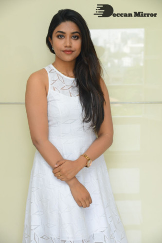 Telugu Actress Malavika Satheesan photoshoot in a white dress