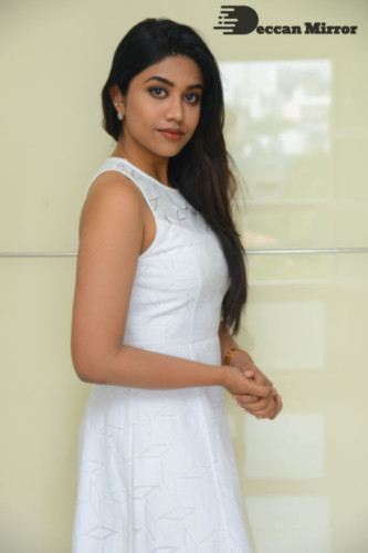 Telugu Actress Malavika Satheesan photoshoot in a white dress