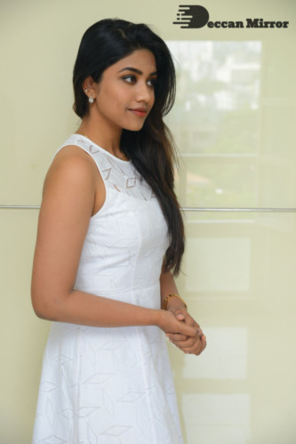 Telugu Actress Malavika Satheesan photoshoot in a white dress