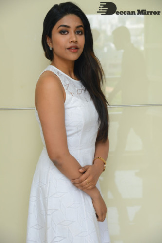 Telugu Actress Malavika Satheesan photoshoot in a white dress