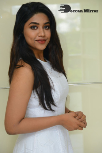 Telugu Actress Malavika Satheesan photoshoot in a white dress