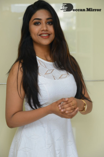 Telugu Actress Malavika Satheesan photoshoot in a white dress