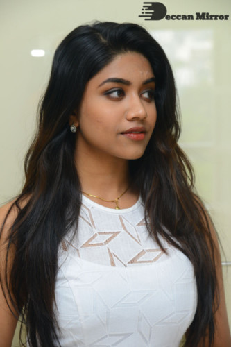 Telugu Actress Malavika Satheesan photoshoot in a white dress