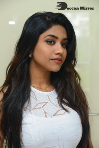Telugu Actress Malavika Satheesan photoshoot in a white dress