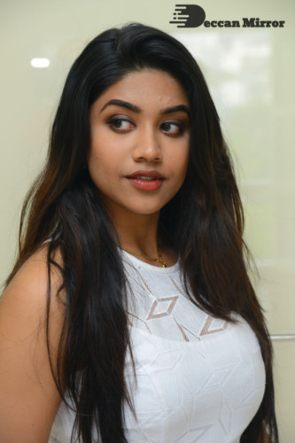 Telugu Actress Malavika Satheesan photoshoot in a white dress