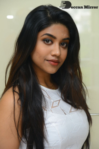 Telugu Actress Malavika Satheesan photoshoot in a white dress