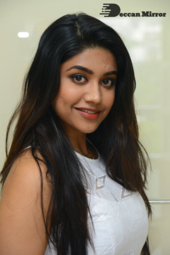 Telugu Actress Malavika Satheesan photoshoot in a white dress