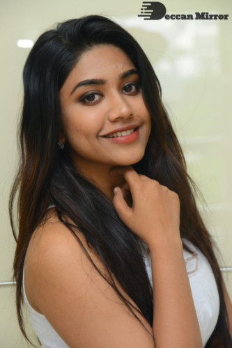 Telugu Actress Malavika Satheesan photoshoot in a white dress