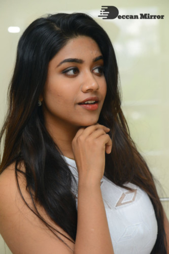 Telugu Actress Malavika Satheesan photoshoot in a white dress