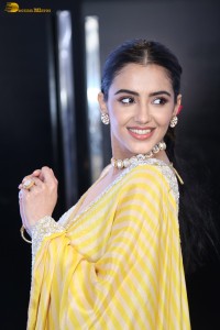 actress Malvika Sharma stunning in a yellow saree