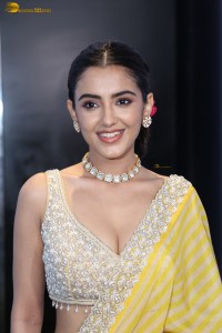 actress Malvika Sharma stunning in a yellow saree