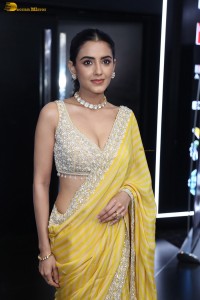 actress Malvika Sharma stunning in a yellow saree