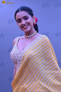 actress Malvika Sharma stunning in a yellow saree